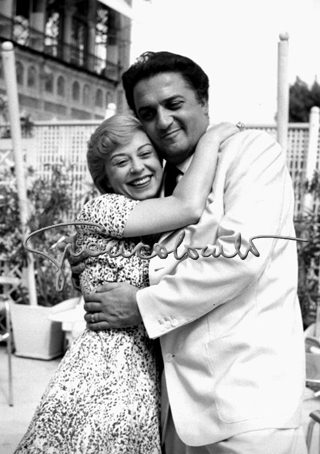 Federico Fellini e Giulietta Masina. Mostra del Cinema di Venezia, 1955