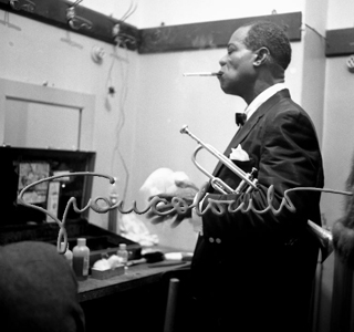 Louis Armstrong in camerino.